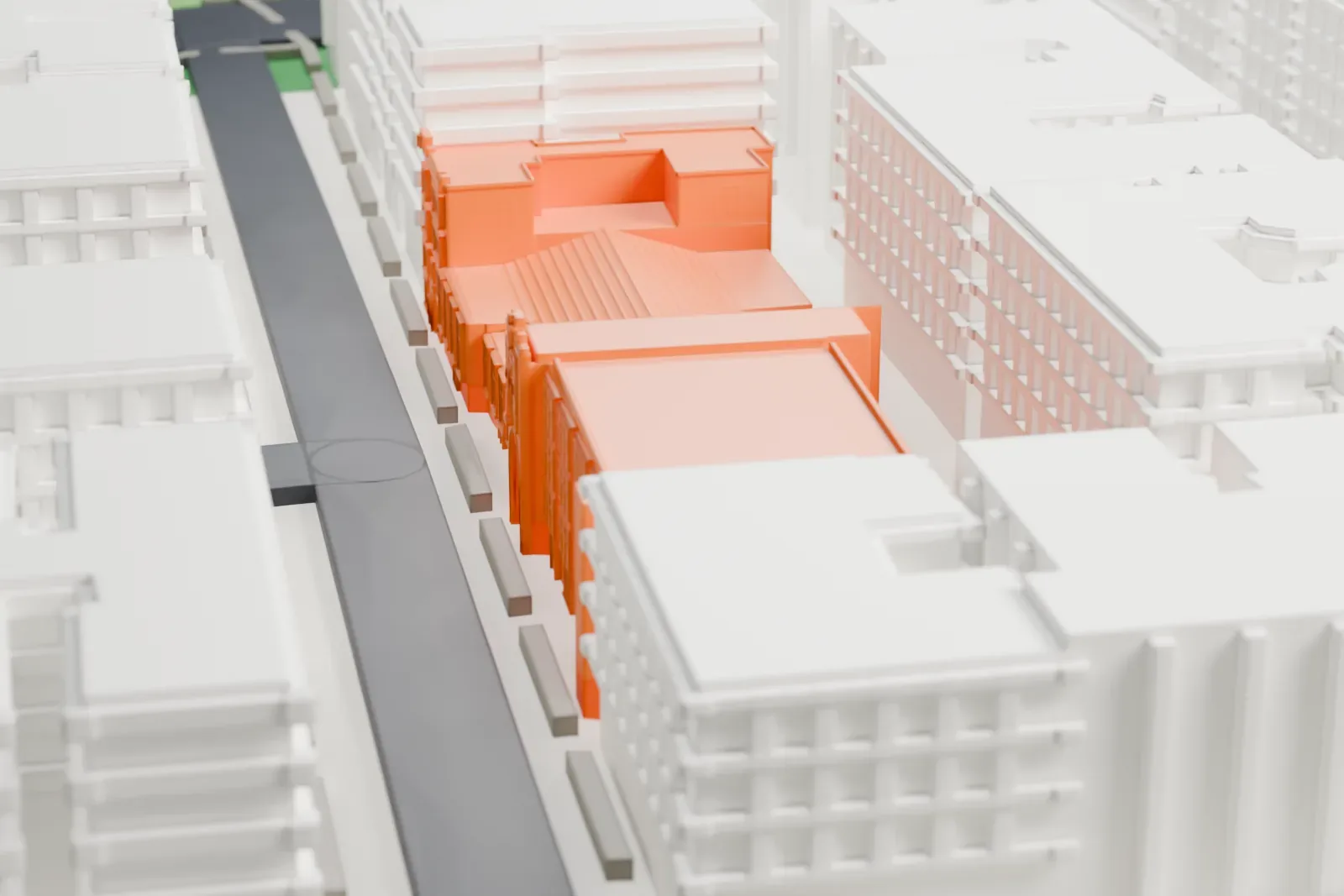 A white 3D print of Our Lady Queen of Martyrs Church, a long low building with a pitched roof, set between taller buildings on closely packed city blocks.