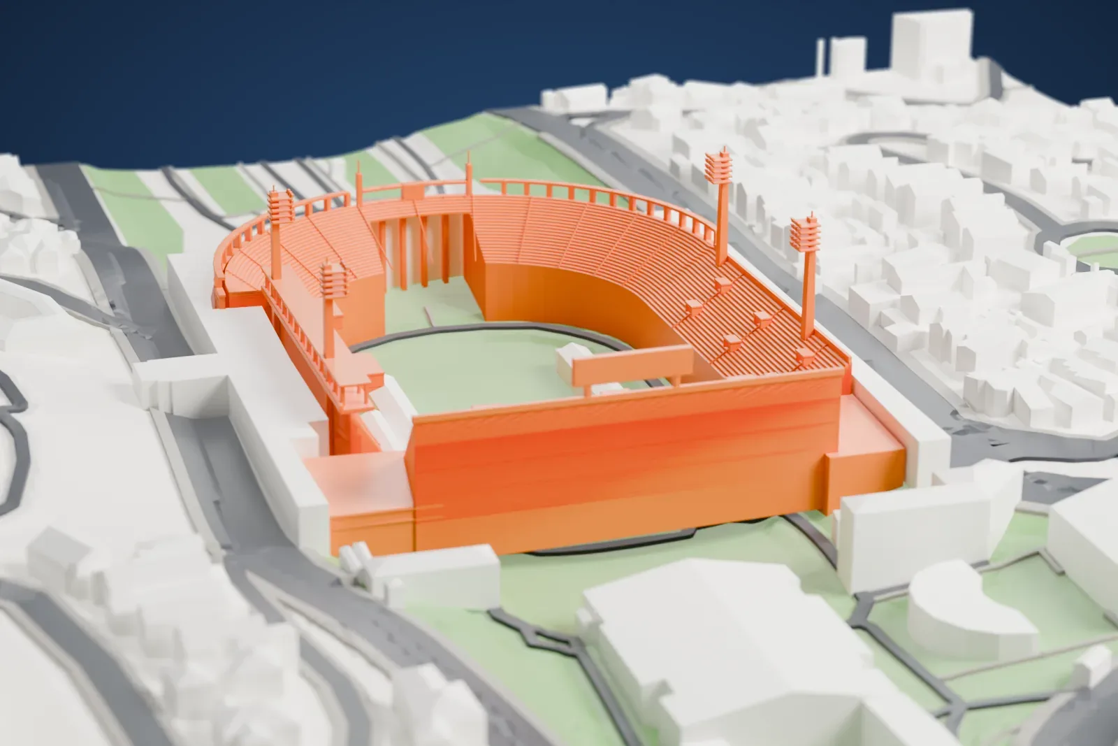 A white 3D print of the Pacaembu Stadium, its stands around the pitch among the surrounding buildings of São Paulo.