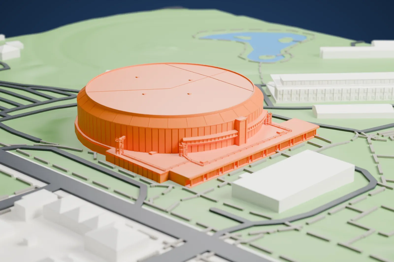 A white 3D print of Pacific Coliseum, a round arena with a flat roof and a ring of vertical panels, with a low wing on one side, surrounded by park lawns and roads.