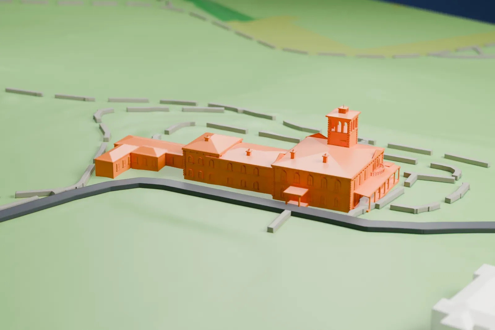 A white 3D print of the Pah Homestead, a large villa with a square central tower, hip roofs and a wide veranda, set in open parkland with curving paths.