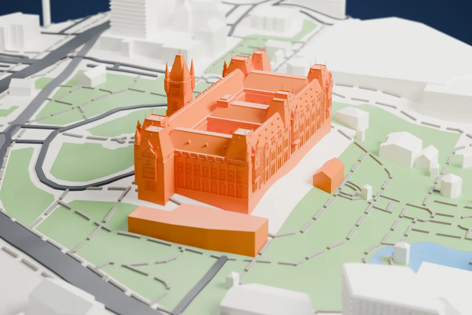 A white 3D print of the Palace of Culture in Iași, a Gothic-style palace with a clock tower, steep gabled roofs and an inner courtyard, standing in a park with lawns, paths and a ring road.