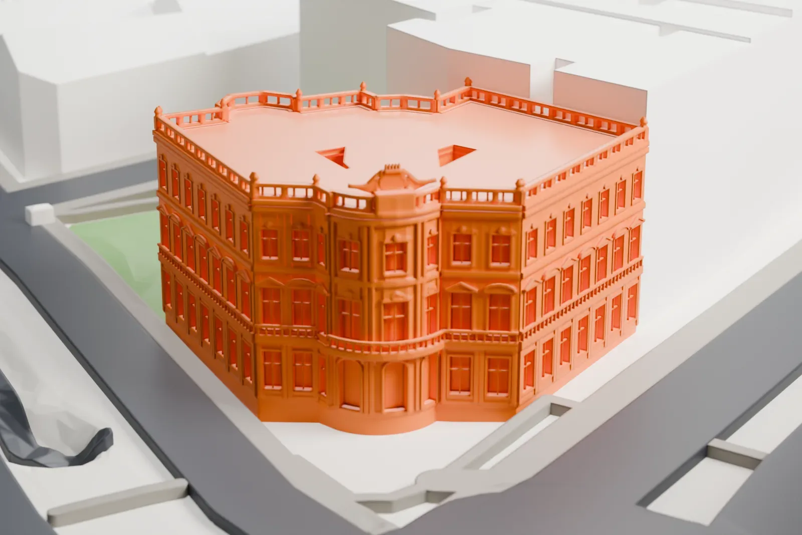 A white 3D print of the Palace of Linares, a palace building standing among surrounding streets and other buildings.