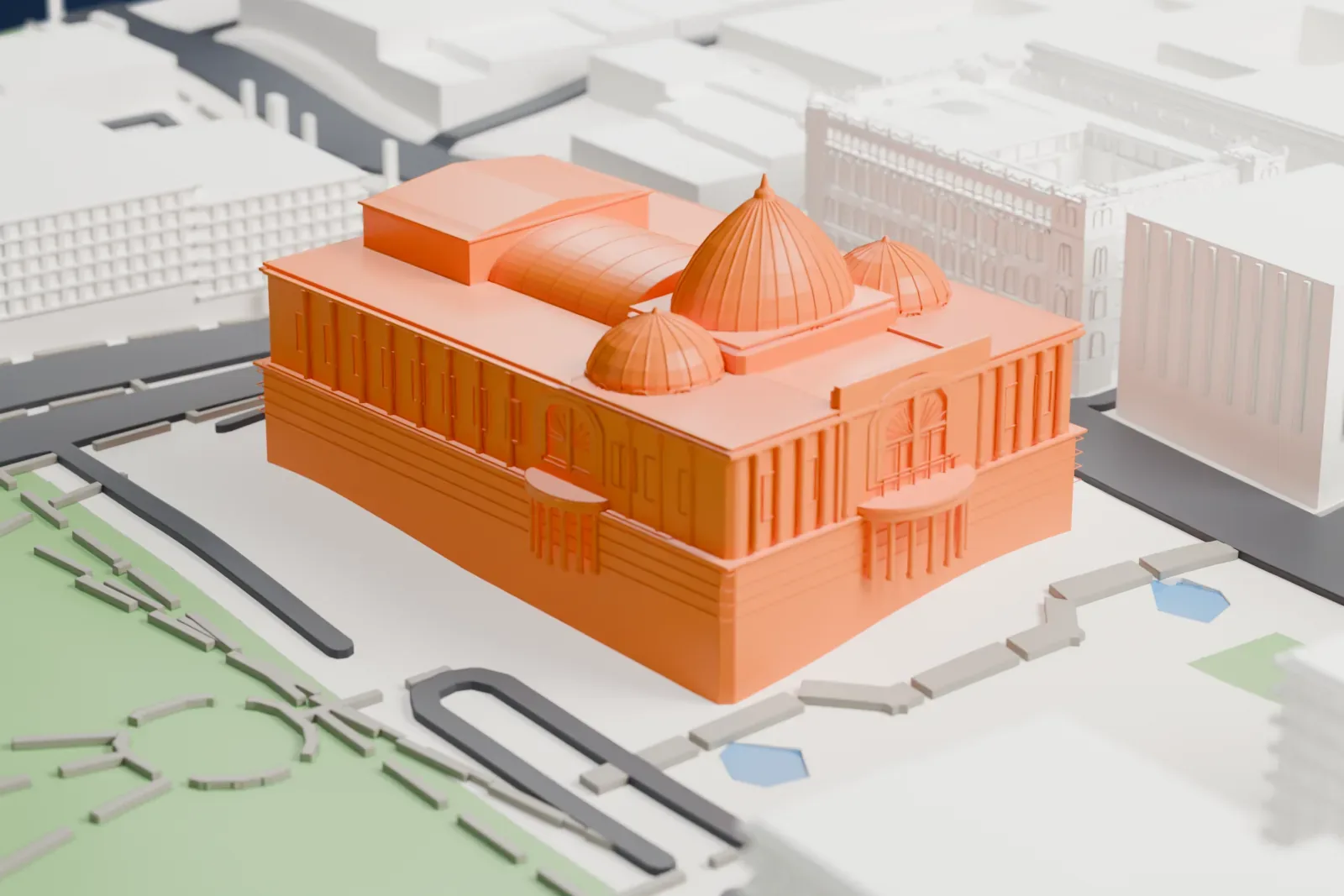 A white 3D print of the Palacio de Bellas Artes, a large rectangular building with a central ribbed dome, two smaller domes and columned porches, beside a park and city streets.