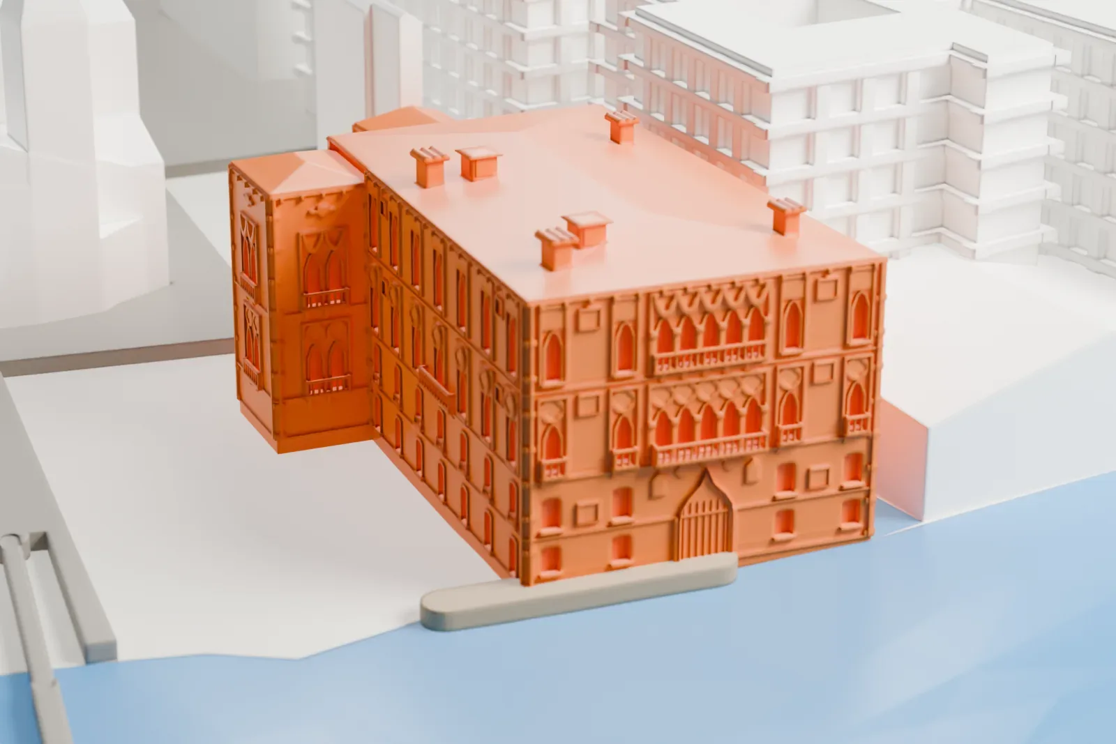 A white 3D print of Palazzo Cavalli-Franchetti, a palace with rows of pointed windows and rooftop chimneys beside the Grand Canal, with other buildings around it.