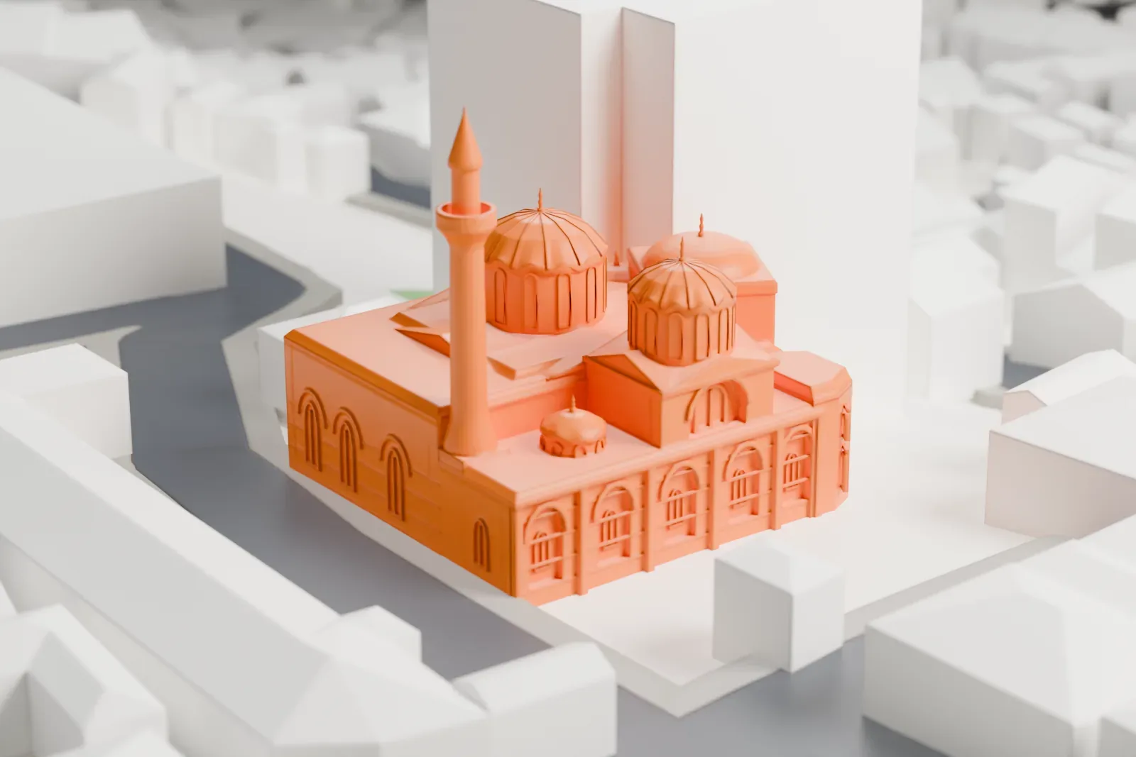 A white 3D print of the Pammakaristos Church, a compact church building among the surrounding streets and buildings of the Fatih district in Istanbul.