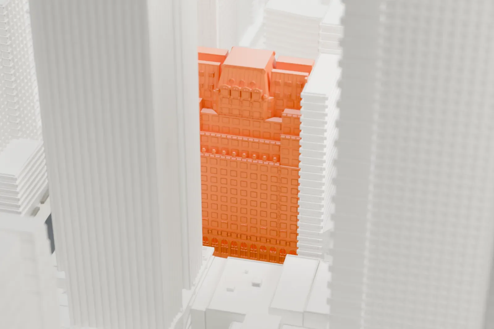 A white 3D print of the Paramount Hotel, a tall slim building with stepped upper floors, squeezed between neighboring towers in Midtown.