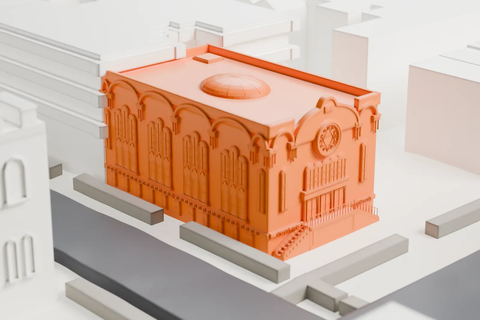 A white 3D print of the Park Slope Jewish Center, a boxy building with tall arched windows and a low dome on its roof, on a street corner among smaller buildings.