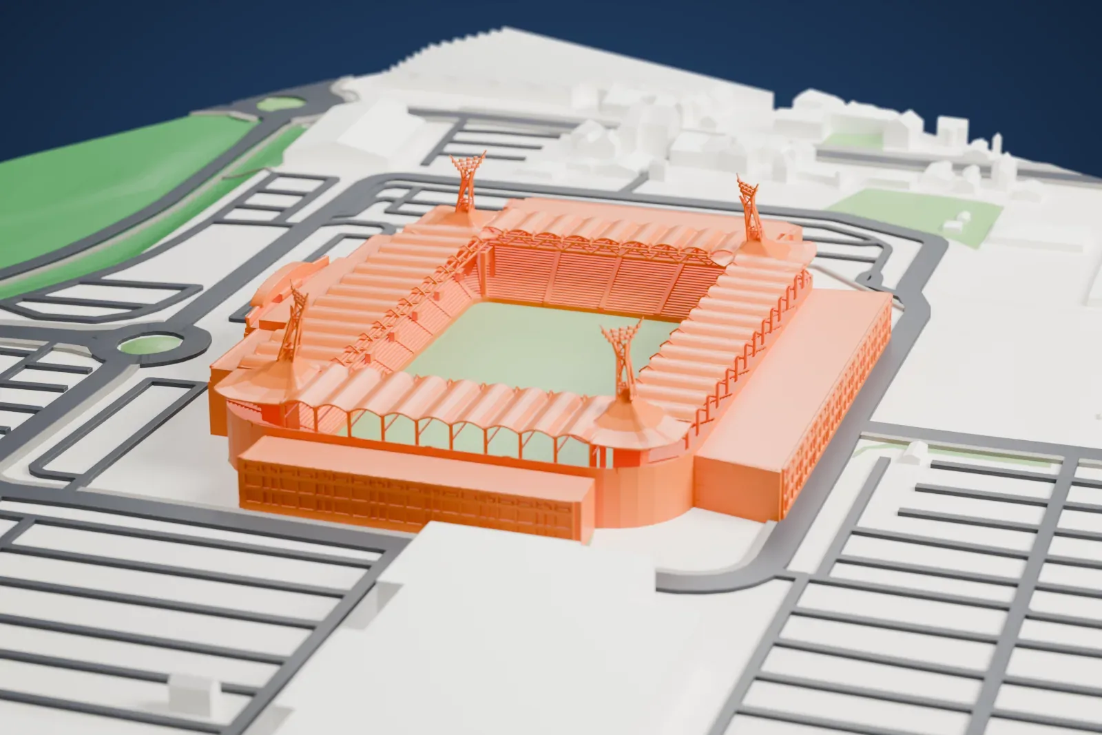 A white 3D print of Parkstad Limburg Stadion, a football stadium with scalloped roofs and four corner masts, surrounded by parking lots, roads and large buildings.