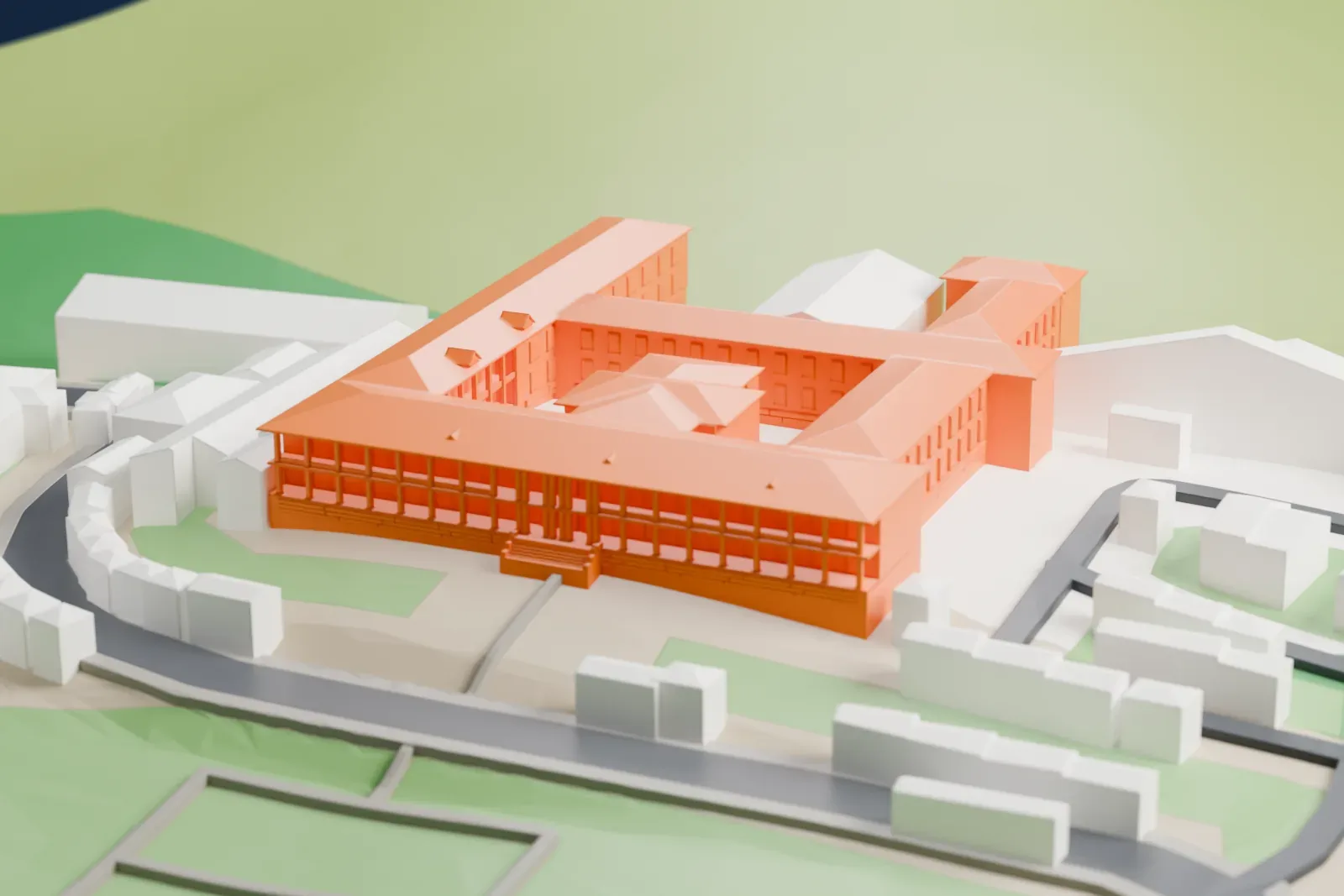 A white 3D print of the Parliament Building in Windhoek, a hip-roofed building with wings around a small courtyard, set on green ground among low buildings.