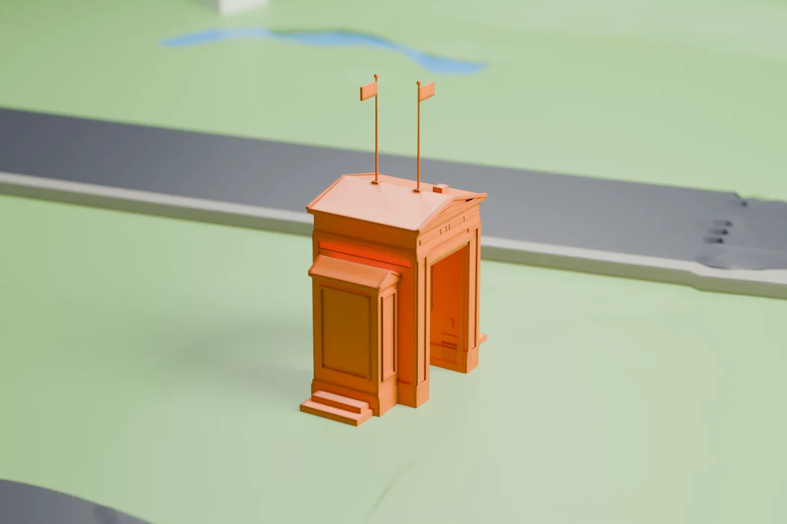A white 3D print of the Peace Arch among the surrounding streets and buildings.