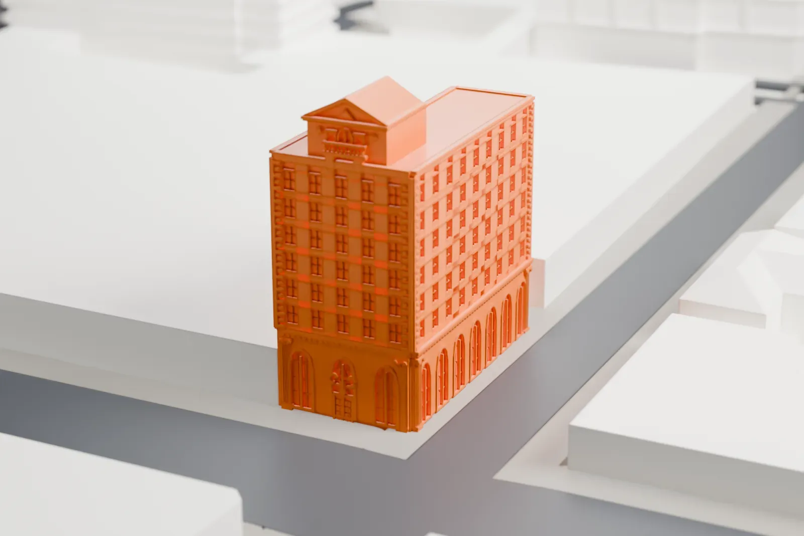 A white 3D print of the Peoples National Bank and Trust Company's building, a nine-story L-shaped building with arched ground-floor windows and a small penthouse on the roof, hemmed in by larger buildings.
