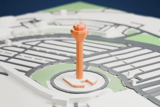 A white 3D print of the Perth Airport Control Tower model in Perth, with the streets around it.