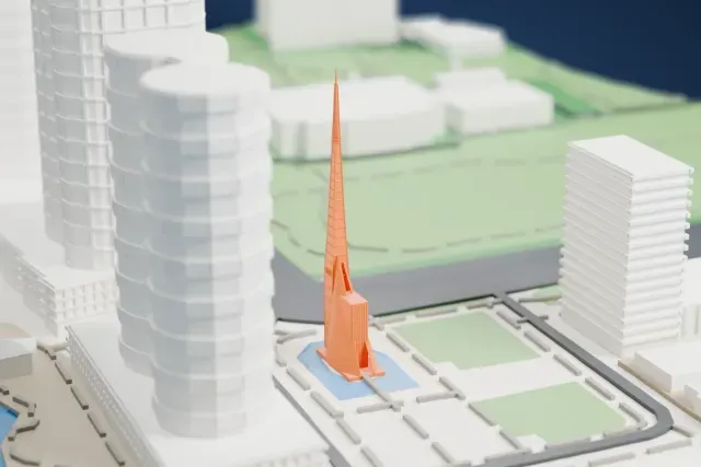 A white 3D print of the Bell Tower (Perth) model in Perth, with the streets around it.