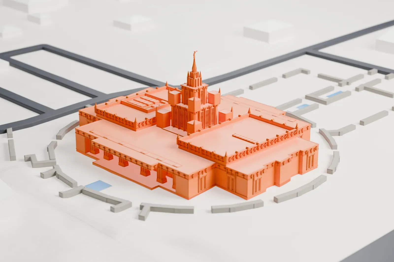 A white 3D print of the Phoenix Arizona Temple, a wide, low building with a tall central spire and small pinnacles, inside a ring of low blocks on open ground.
