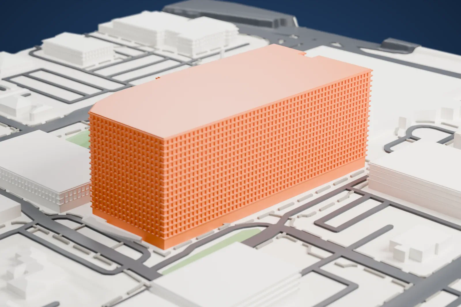 A white 3D print of Phoenix Children's Hospital, a curved multi-story tower with a round marked circle on its roof above a wide low base, surrounded by streets and other buildings.