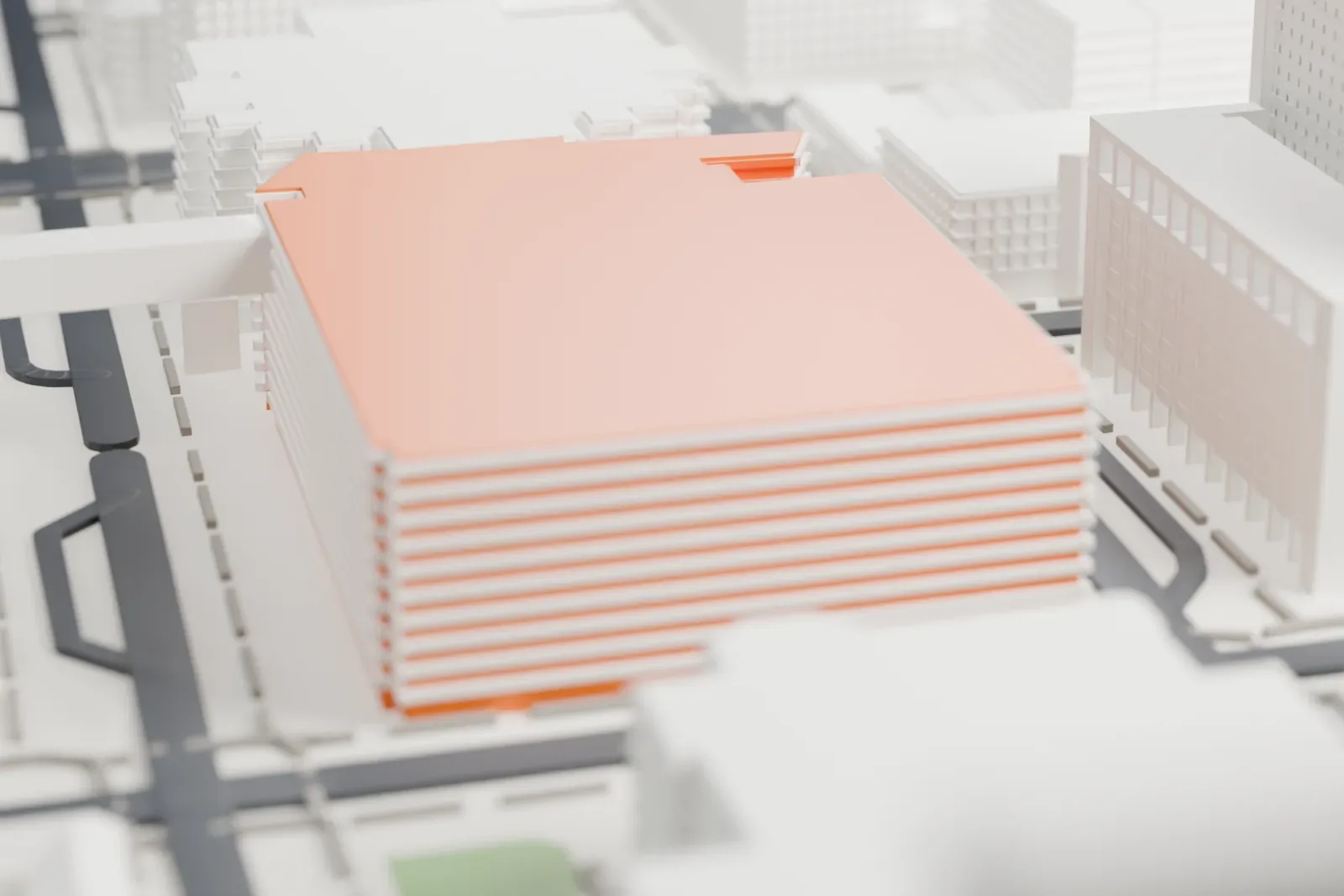A white 3D print of the Phoenix Convention Center West Building, a wide, low hall with a glass-walled corner and a rooftop frame, between wide city streets.