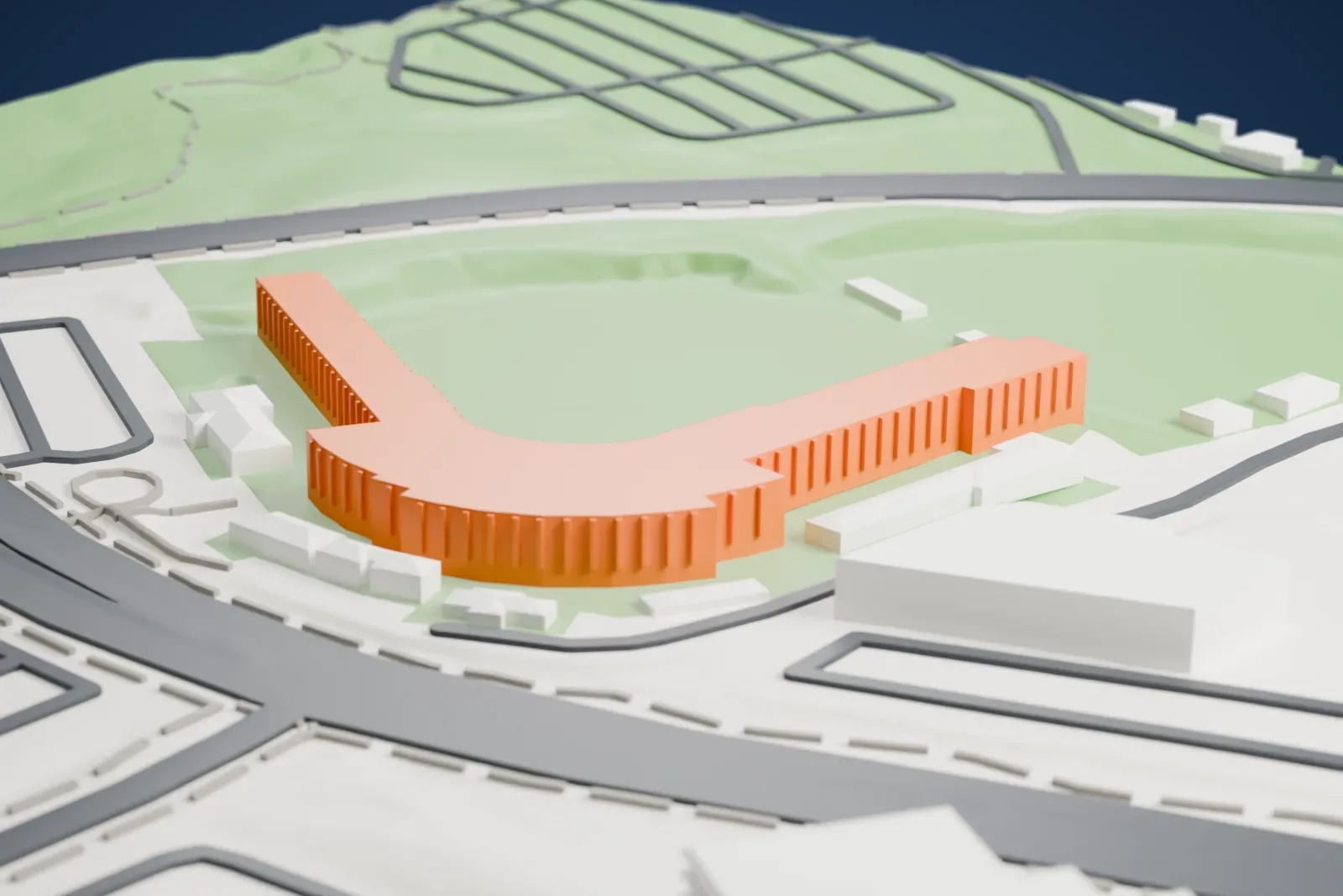 A white 3D print of Phoenix Municipal Stadium, an L-shaped grandstand curving around a green field, with roads and park land around it.