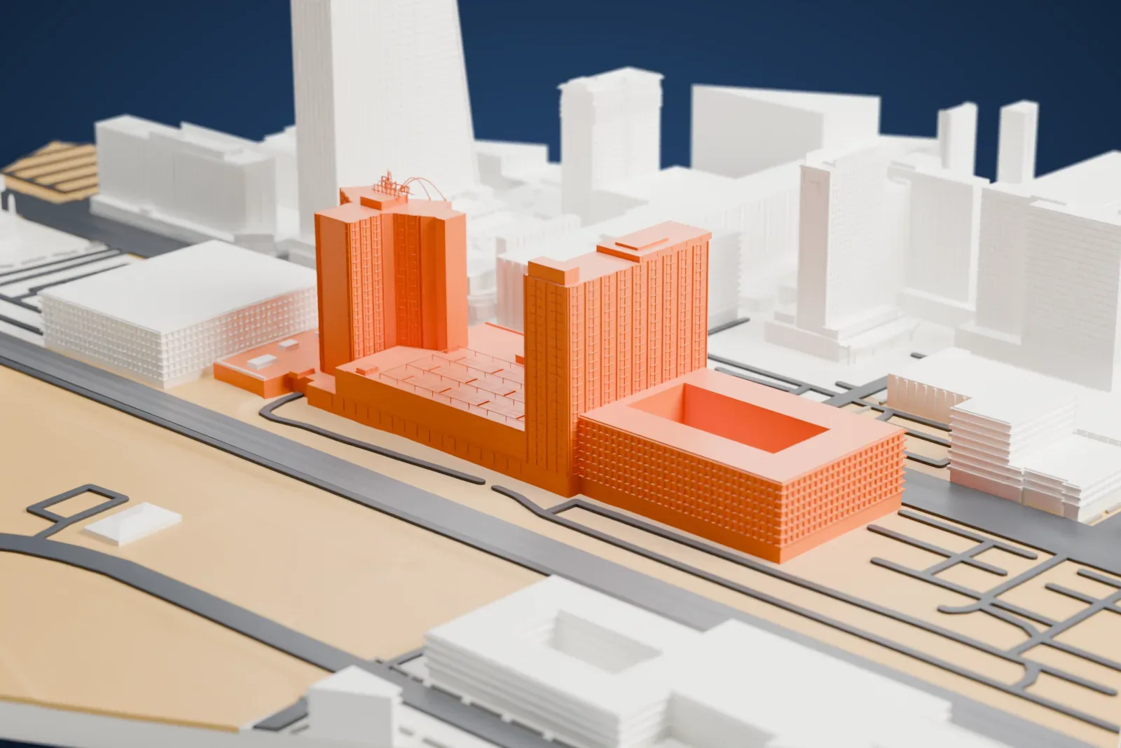 A white 3D print of the Plaza Hotel & Casino, two hotel towers joined by a wide low podium with a busy flat roof, standing among other tall buildings and wide roads.