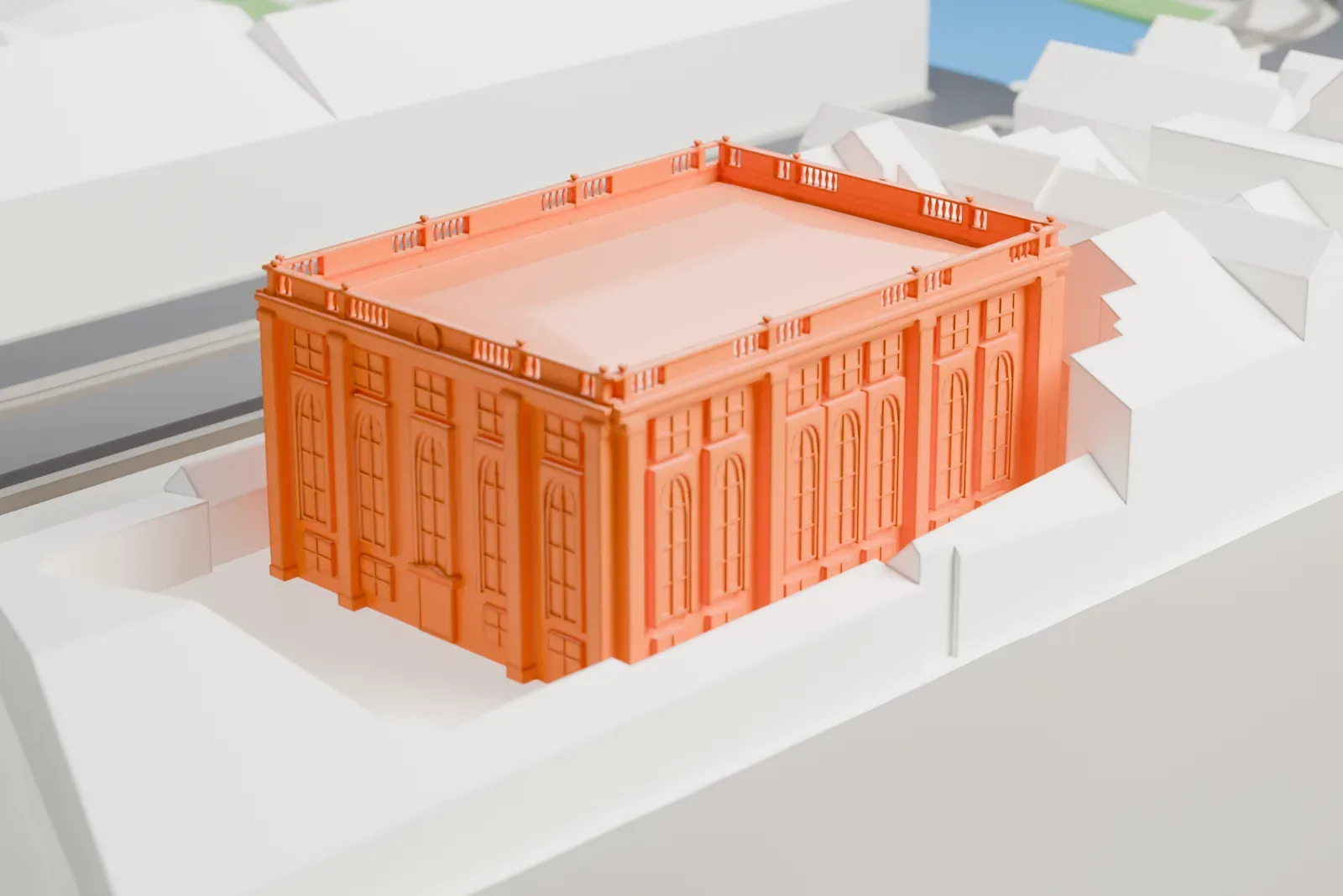 A white 3D print of the Portuguese Synagogue among the surrounding streets and buildings of central Amsterdam.