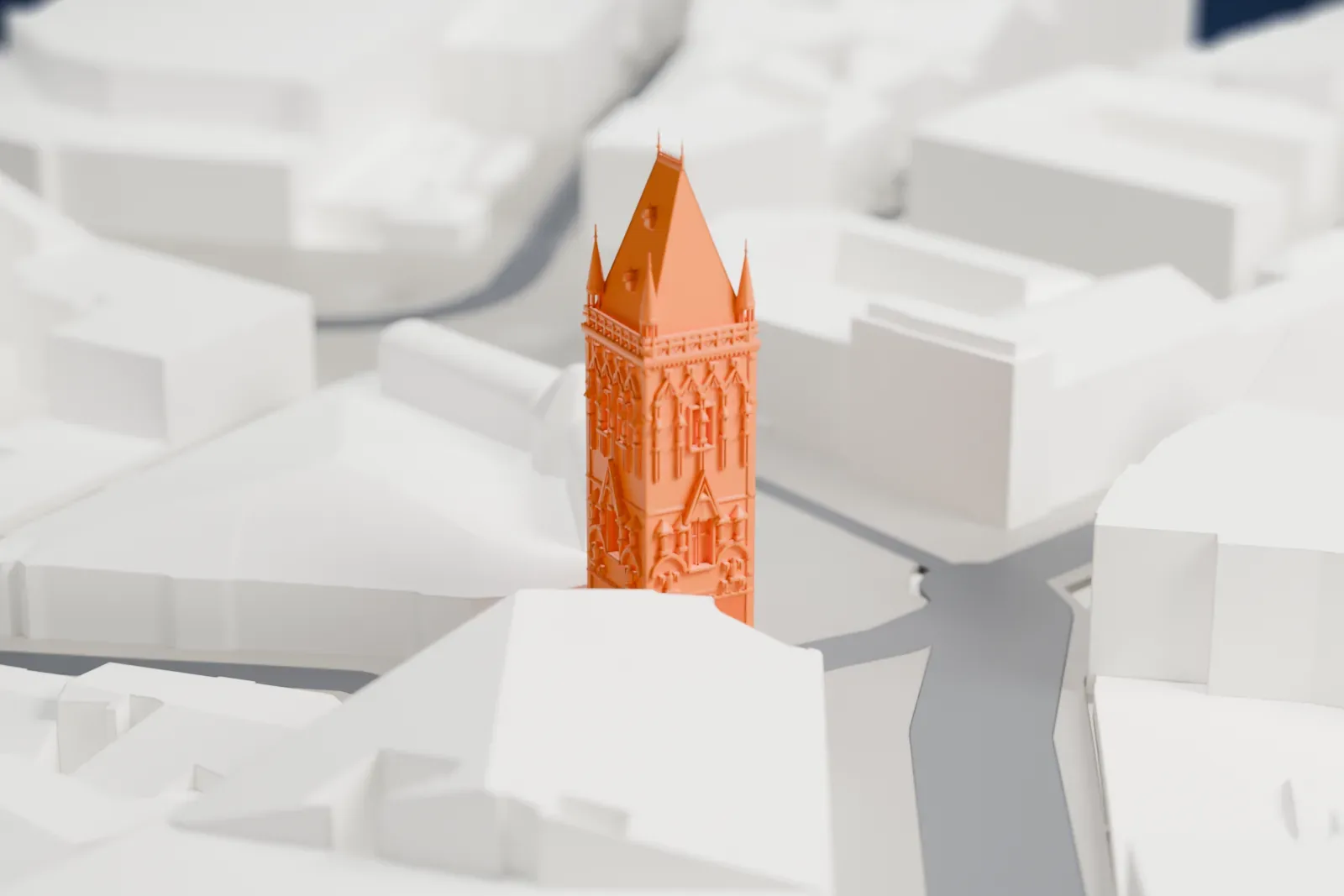 A white 3D print of the Powder Tower, a tall narrow Gothic gate tower with carved ornament on its faces, standing among the surrounding streets and buildings of Prague's Old Town.