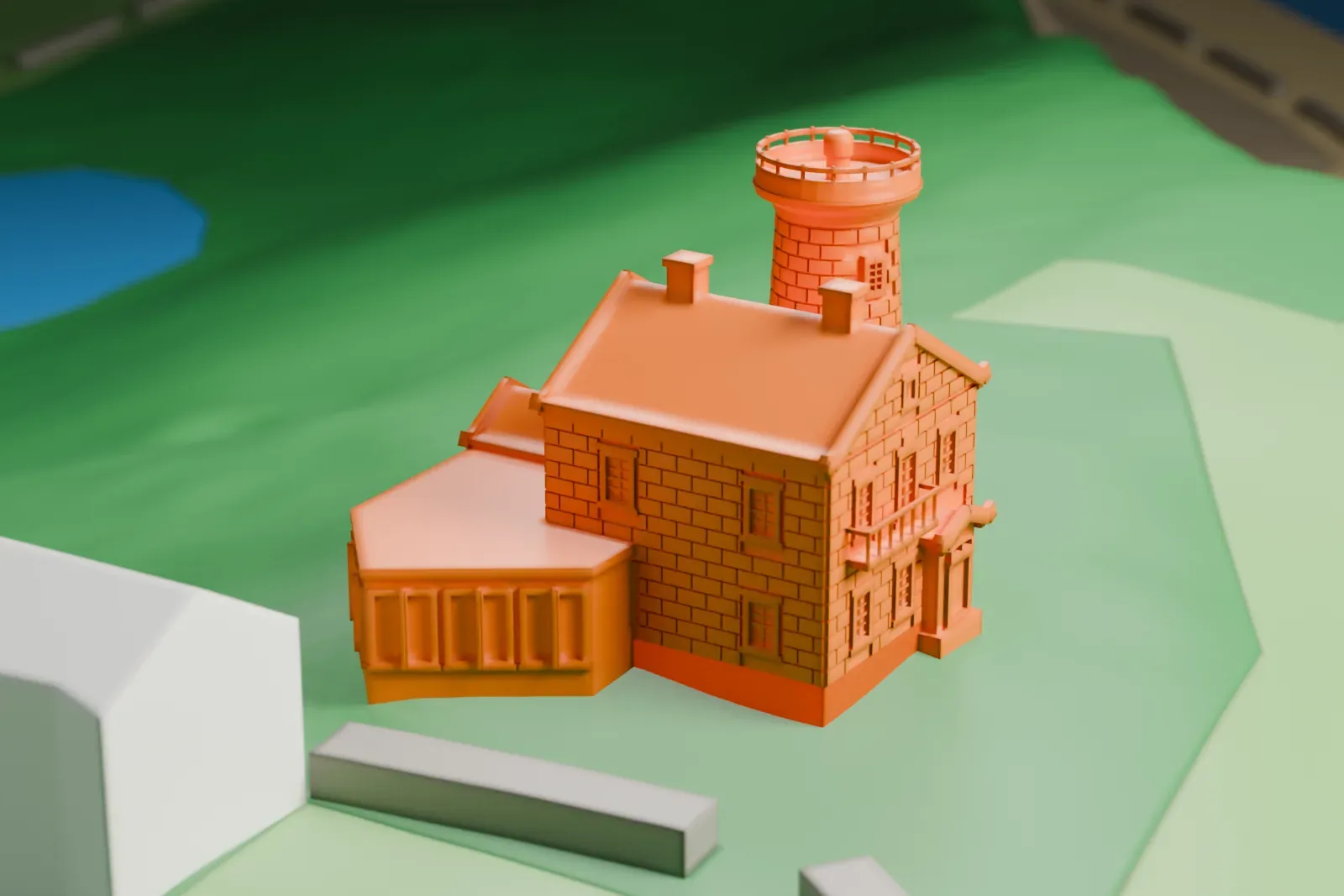 A white 3D print of Prince's Bay Light, a round tower with a railed gallery beside a gabled cottage, standing on a green hilltop with the shore behind it.