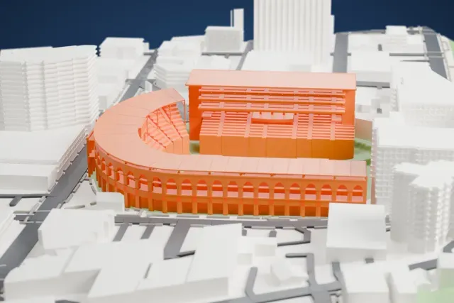A white 3D print of Providence Park, a horseshoe-shaped stadium with an arched curved wall and a lattice-fronted east end around a green pitch, among city blocks.