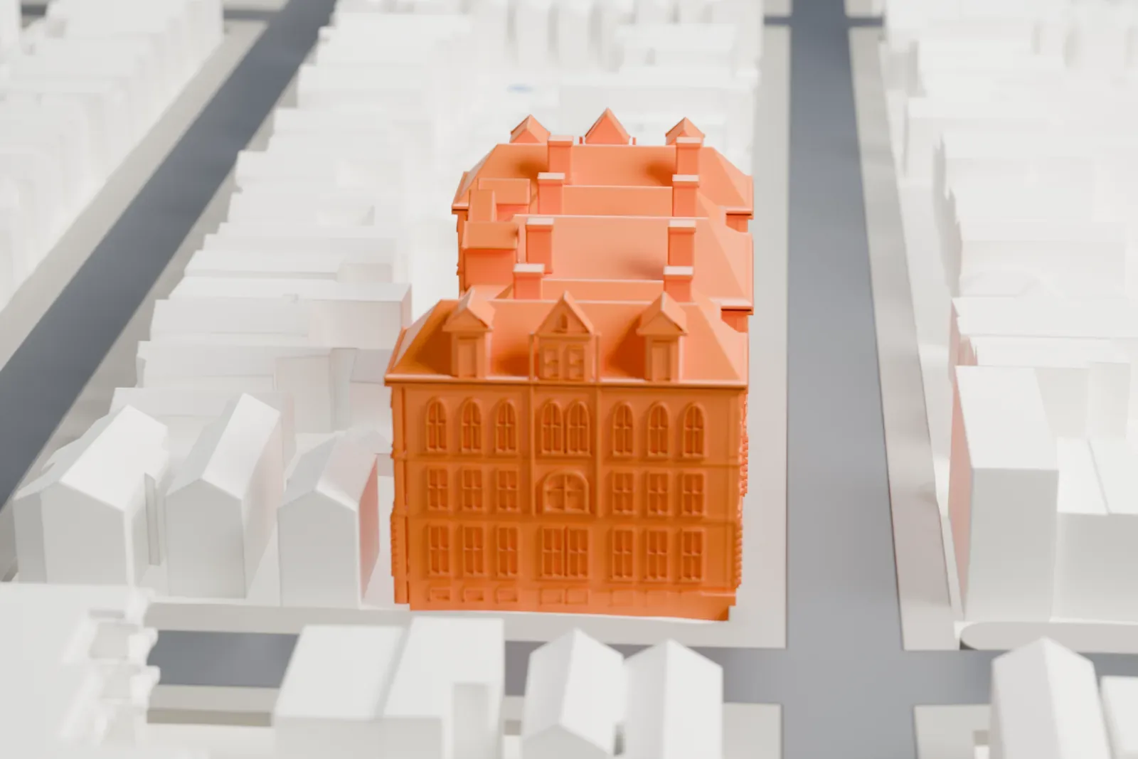 A white 3D print of Public School 108 in Brooklyn, a brick school building with hipped roofs, dormers and chimneys, surrounded by smaller buildings and streets.