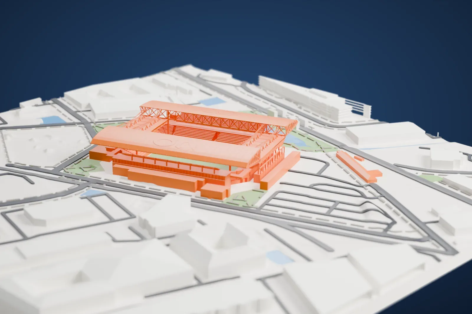 A white 3D print of Q2 Stadium, an open bowl with two long curved roofs over the stands, set among green areas, a pond, roads and low buildings.