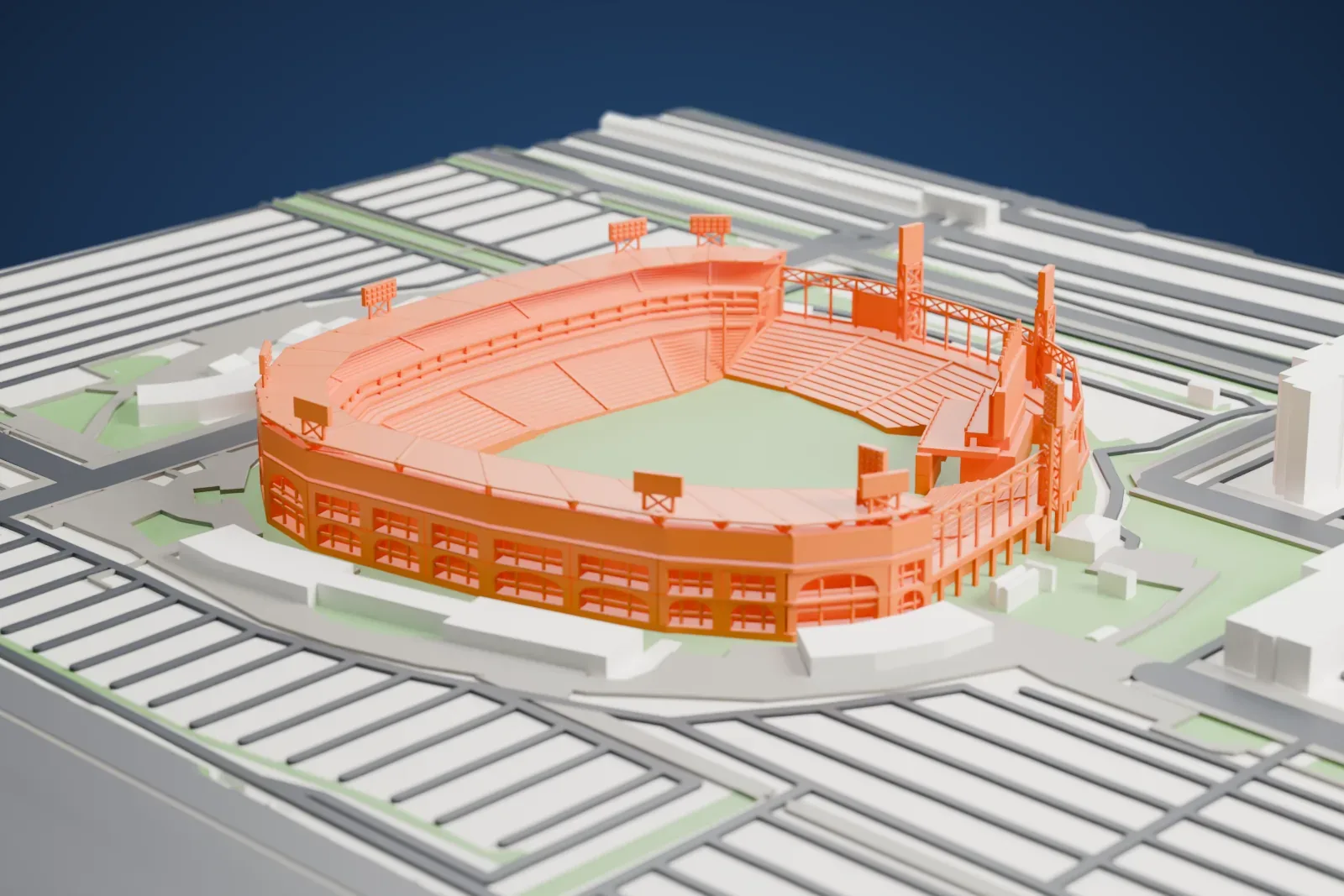 A white 3D print of Rate Field, its open ballpark bowl and canopy roof standing among the surrounding streets and buildings of Chicago's South Side.