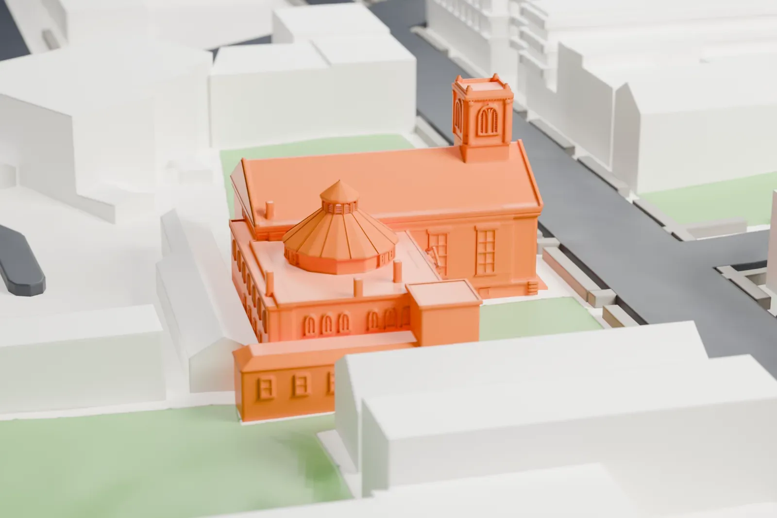 A white 3D print of the Reformed Church on Staten Island, a church with a columned porch and a small square tower, beside streets, lawns and neighboring buildings.
