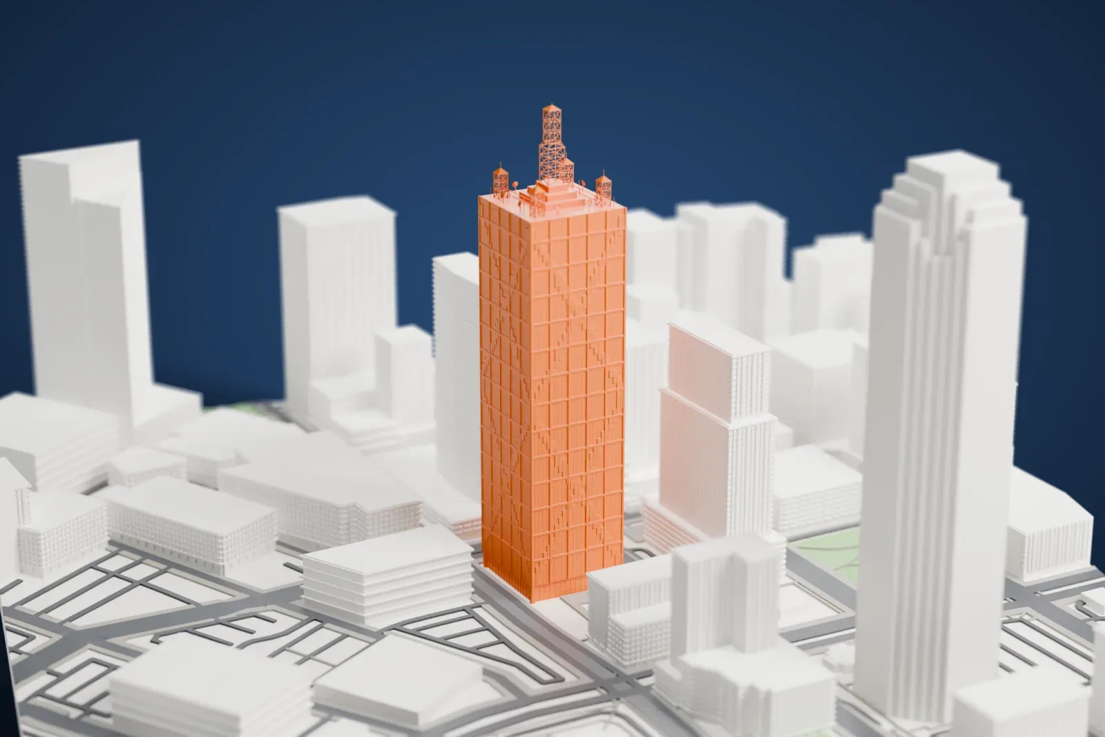 A white 3D print of the Renaissance Tower rising above the surrounding streets and buildings.