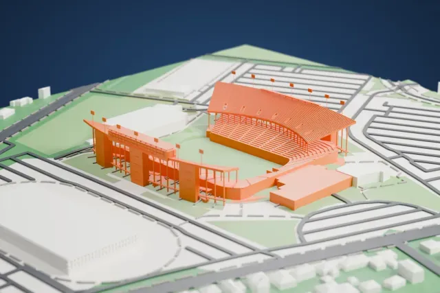 A white 3D print of the Rice Stadium model in Houston, with the streets around it.