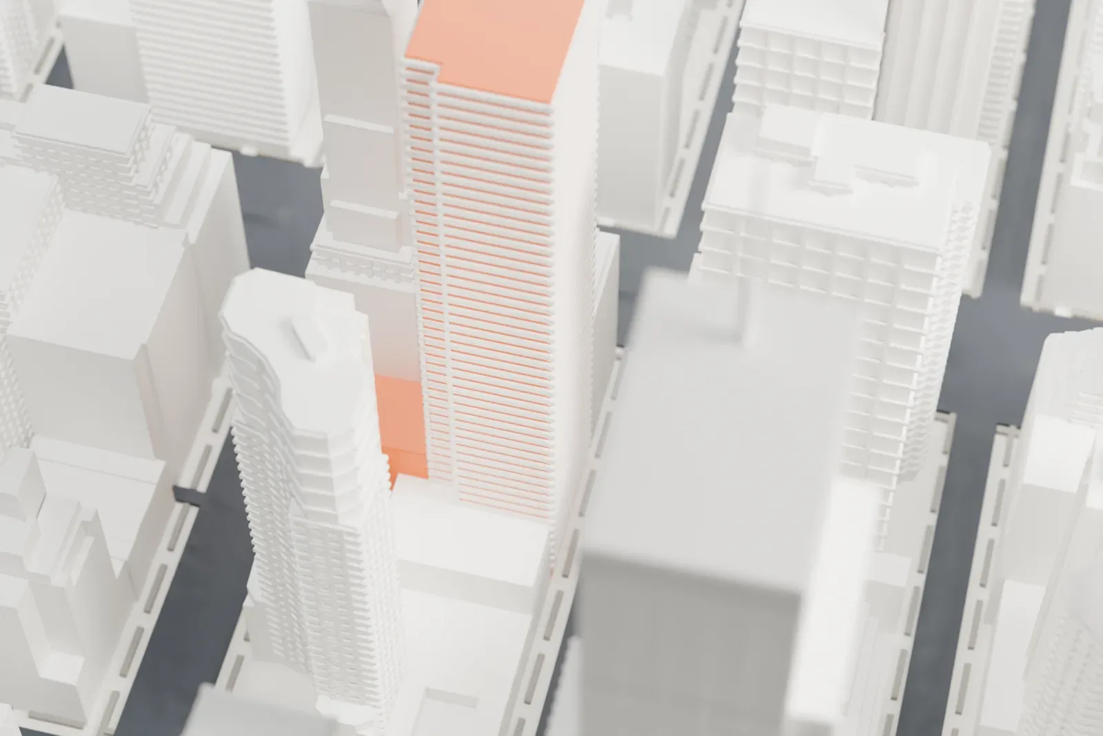 A white 3D print of the Ritz Tower, a stepped tower with a pyramidal roof and a thin spire, rising among taller and wider neighboring buildings.