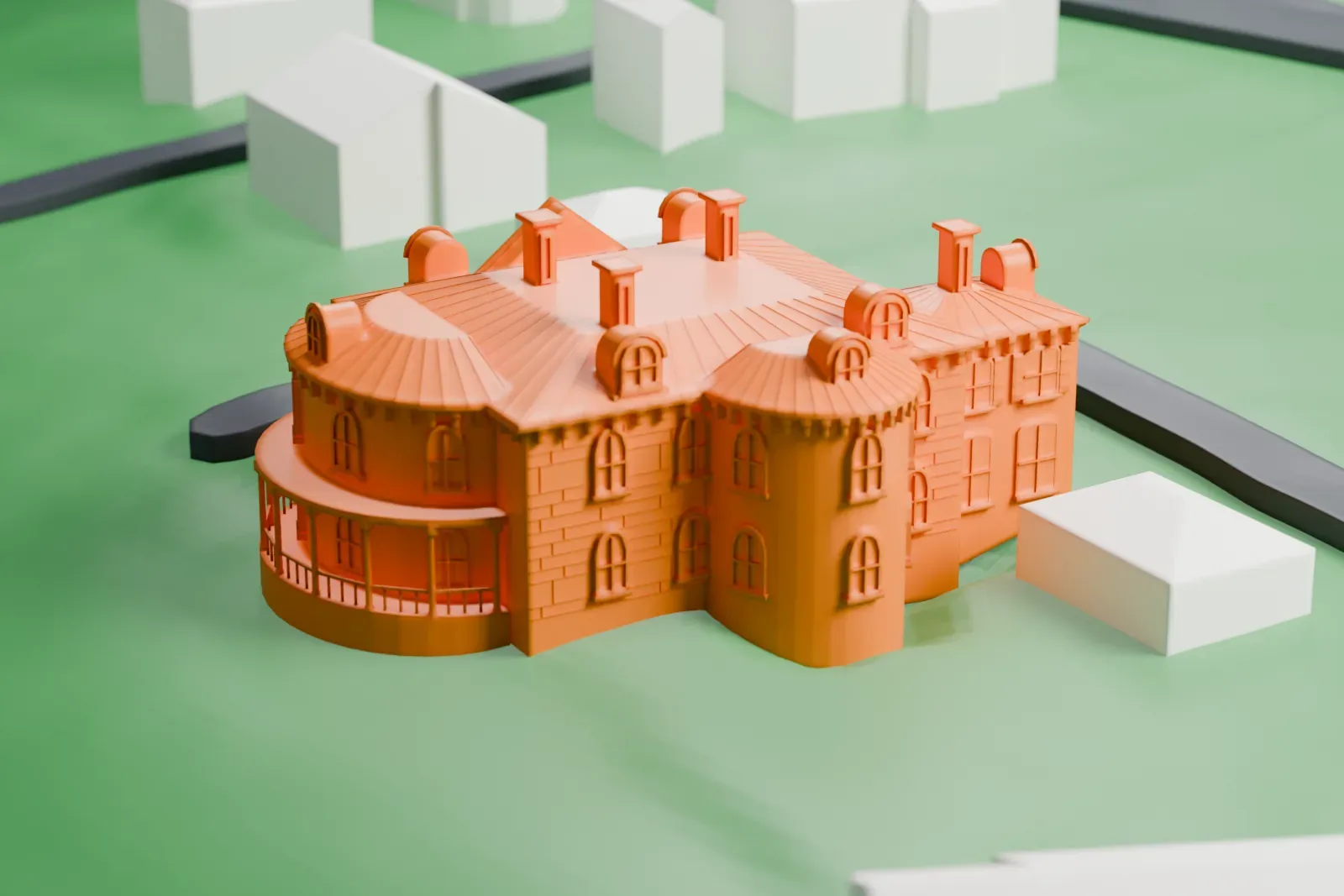 A white 3D print of the Robert Colgate House, a two-story villa with round bays, dormers and chimneys, on a green lawn beside a curving drive.