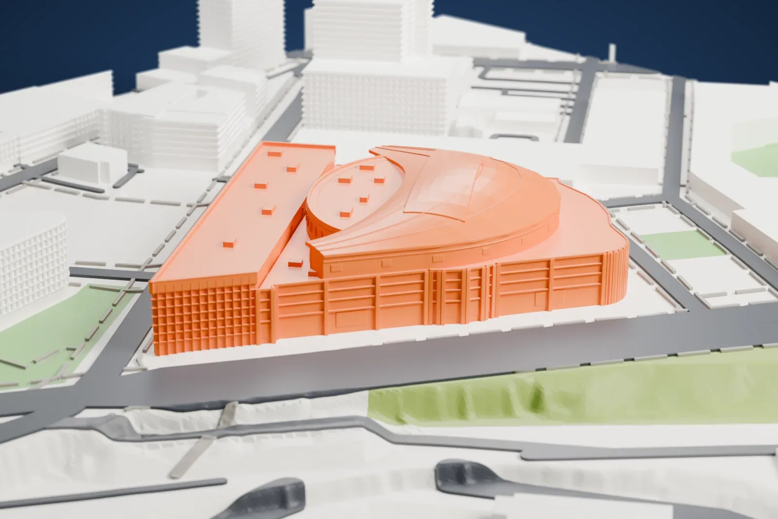 A white 3D print of Rocket Arena, an oval drum in front of a curved metal roof that swells to a high crown, with a glass box along one side, among the streets and buildings around it.