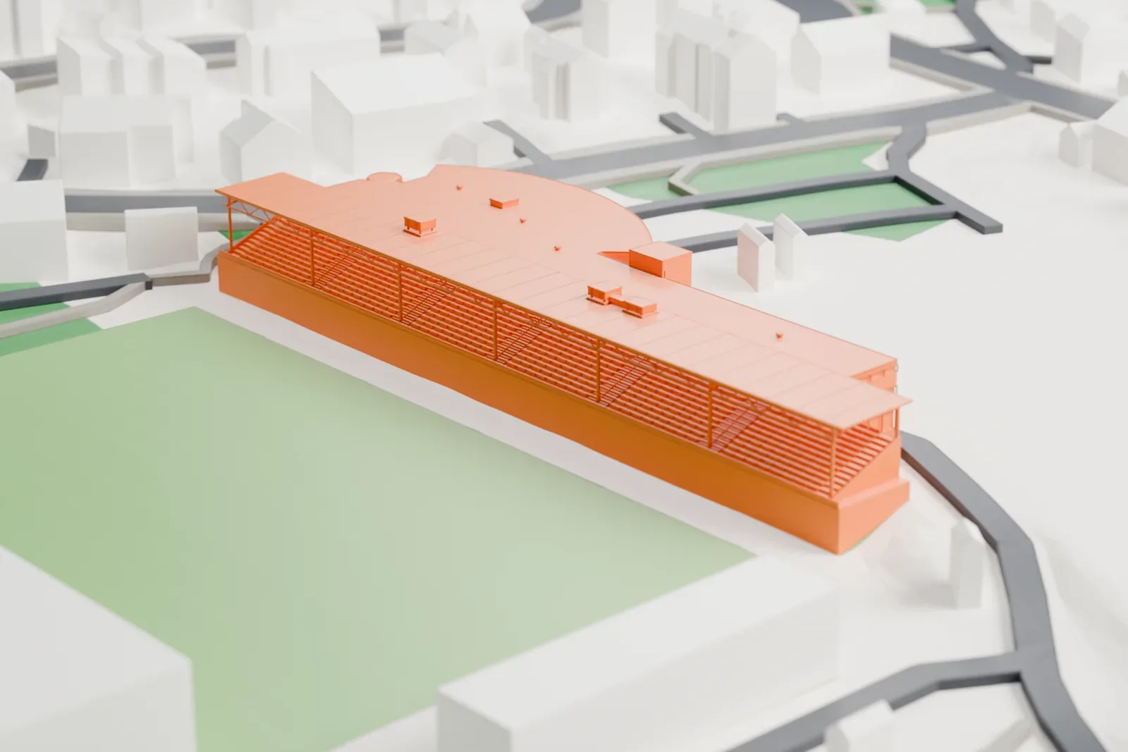 A white 3D print of Romssa Arena's covered east stand, a long shallow-roofed grandstand with a curved office wing and rooftop plant, among surrounding streets and buildings.
