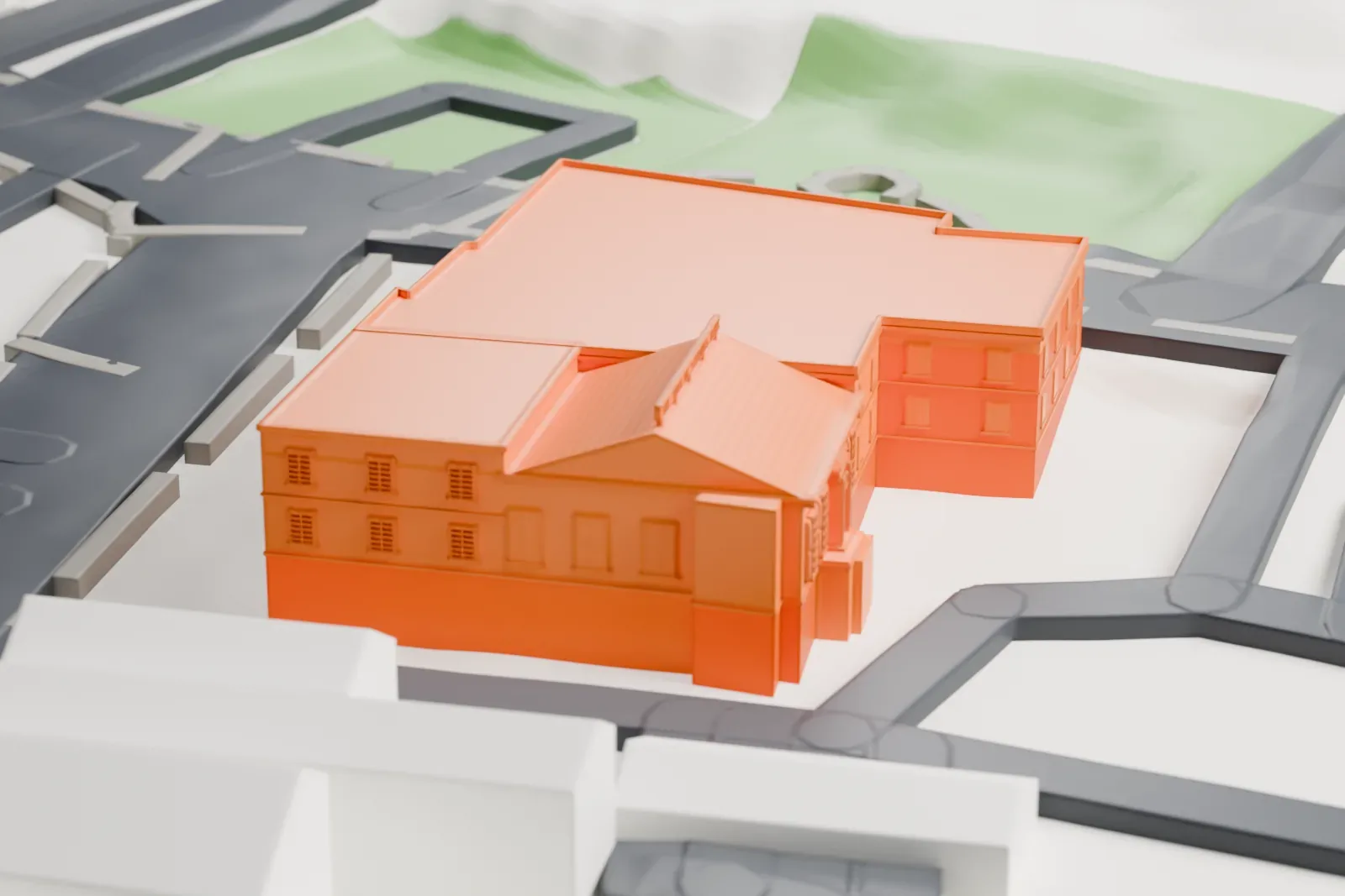 A white 3D print of the Roslyn Savings Bank Building, a broad two-story block with flat roofs and a gabled front, on a corner of several streets beside a small green space.