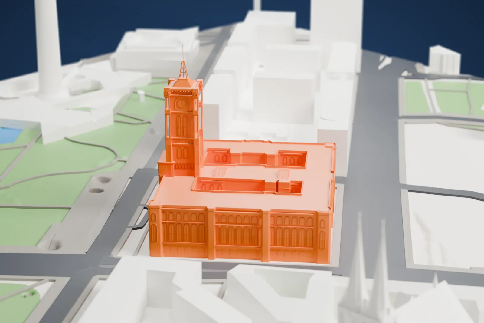 A white 3D print of the Red Town Hall in Berlin, filling a city block with surrounding streets and buildings.