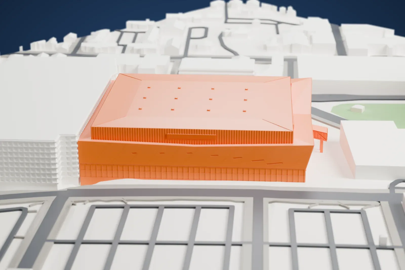 A white 3D print of Rupp Arena in downtown Lexington, with surrounding streets and buildings.