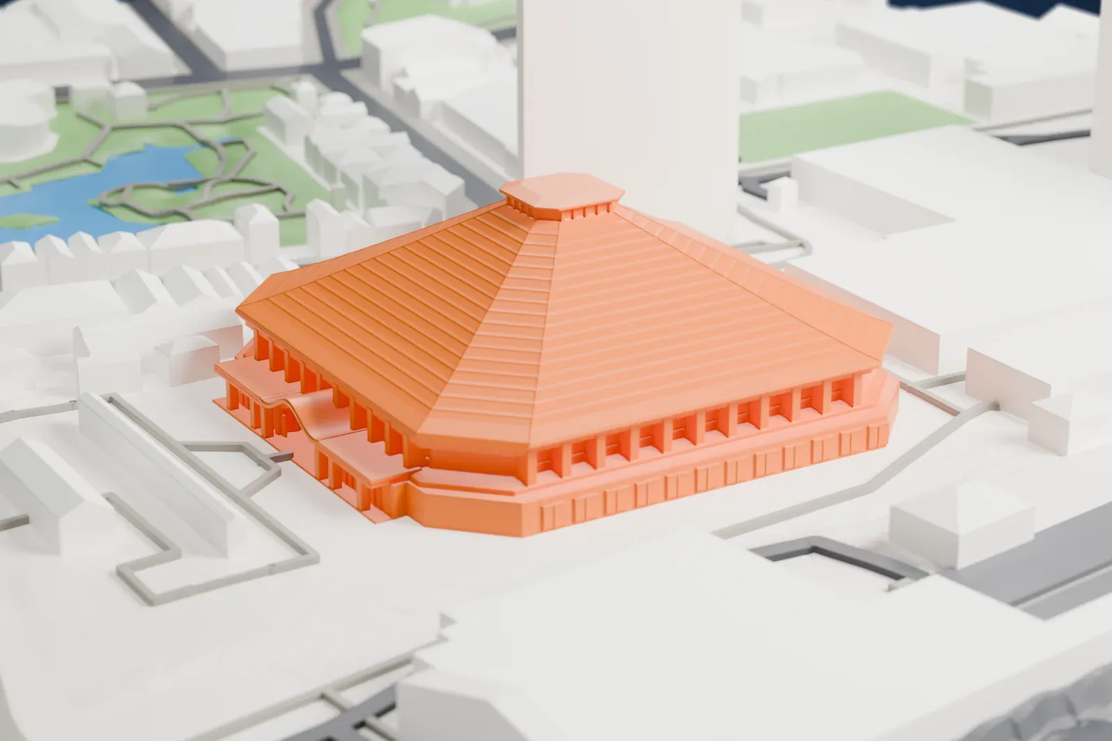 A white 3D print of Ryōgoku Kokugikan, a large hall standing among the surrounding city buildings.