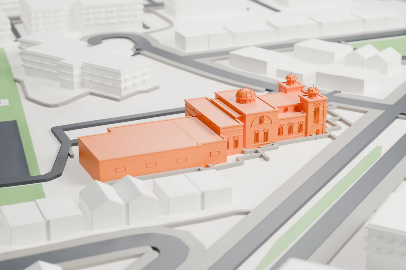 A white 3D print of the Saint Sauveur Cathedral with the surrounding streets and buildings.