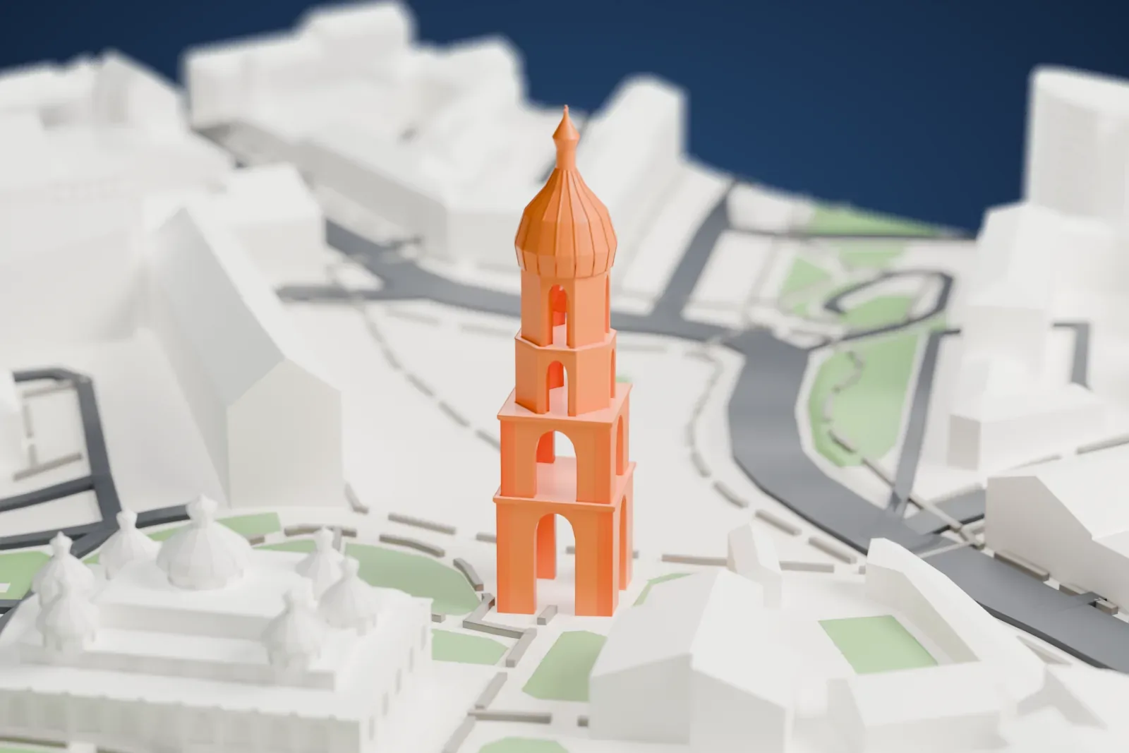 A white 3D print of Saint Sophia Cathedral, a low building crowned with a cluster of onion-shaped domes, beside a tall separate bell tower, with paths, patches of green and low buildings around them.