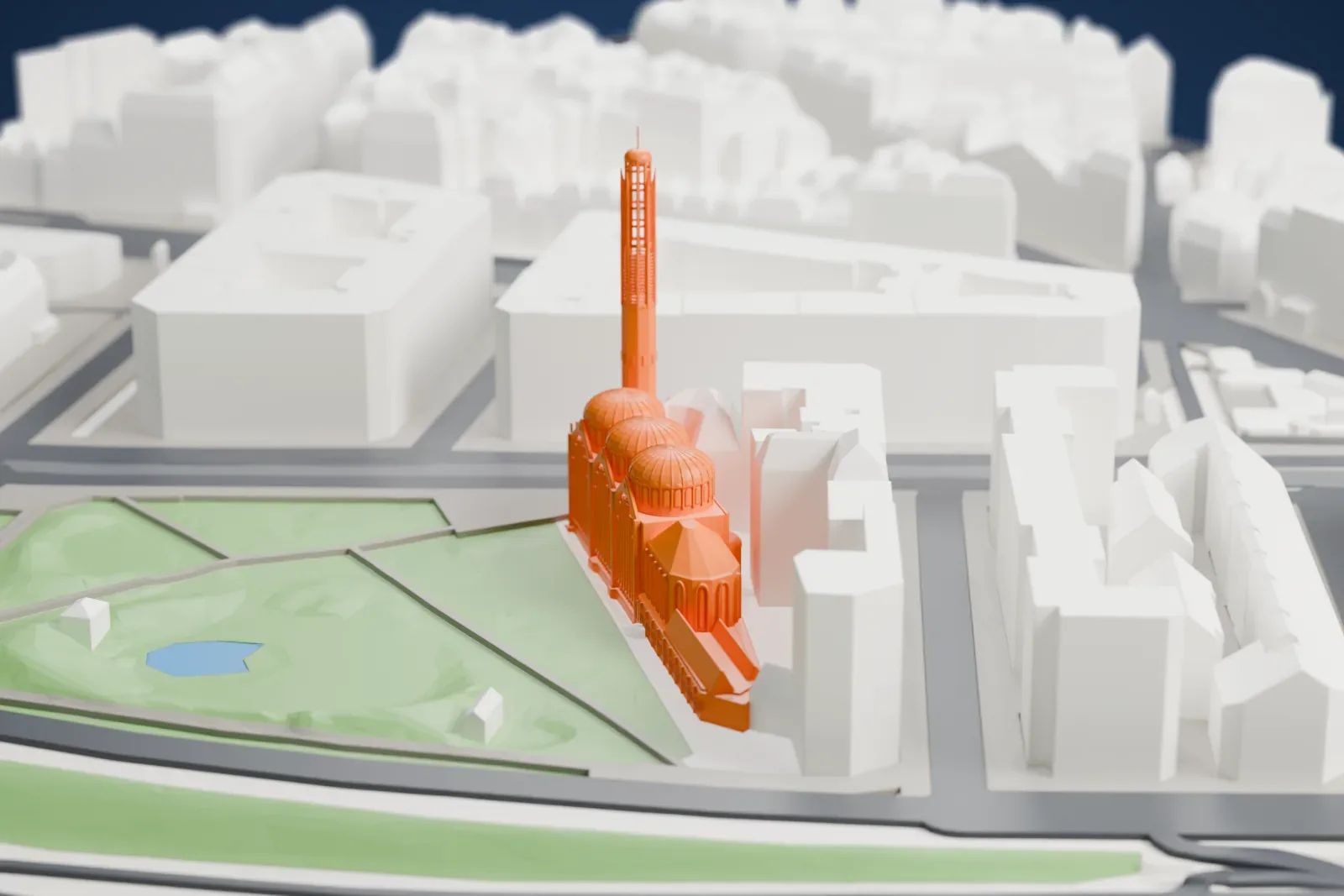 A white 3D print of Église Sainte-Odile, a church with a tall bell tower, among the surrounding streets and buildings of the 17th arrondissement in Paris.