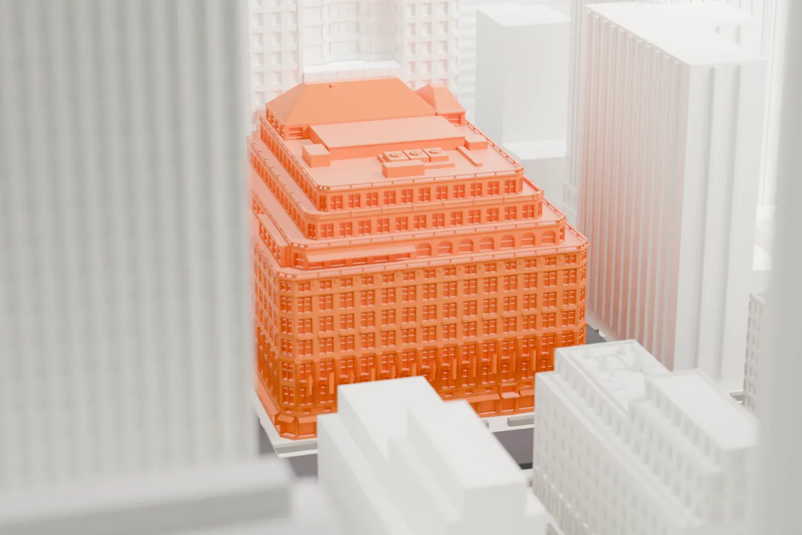 A white 3D print of the Saks Fifth Avenue flagship store, a stepped building with a detailed facade, tucked between much taller towers.