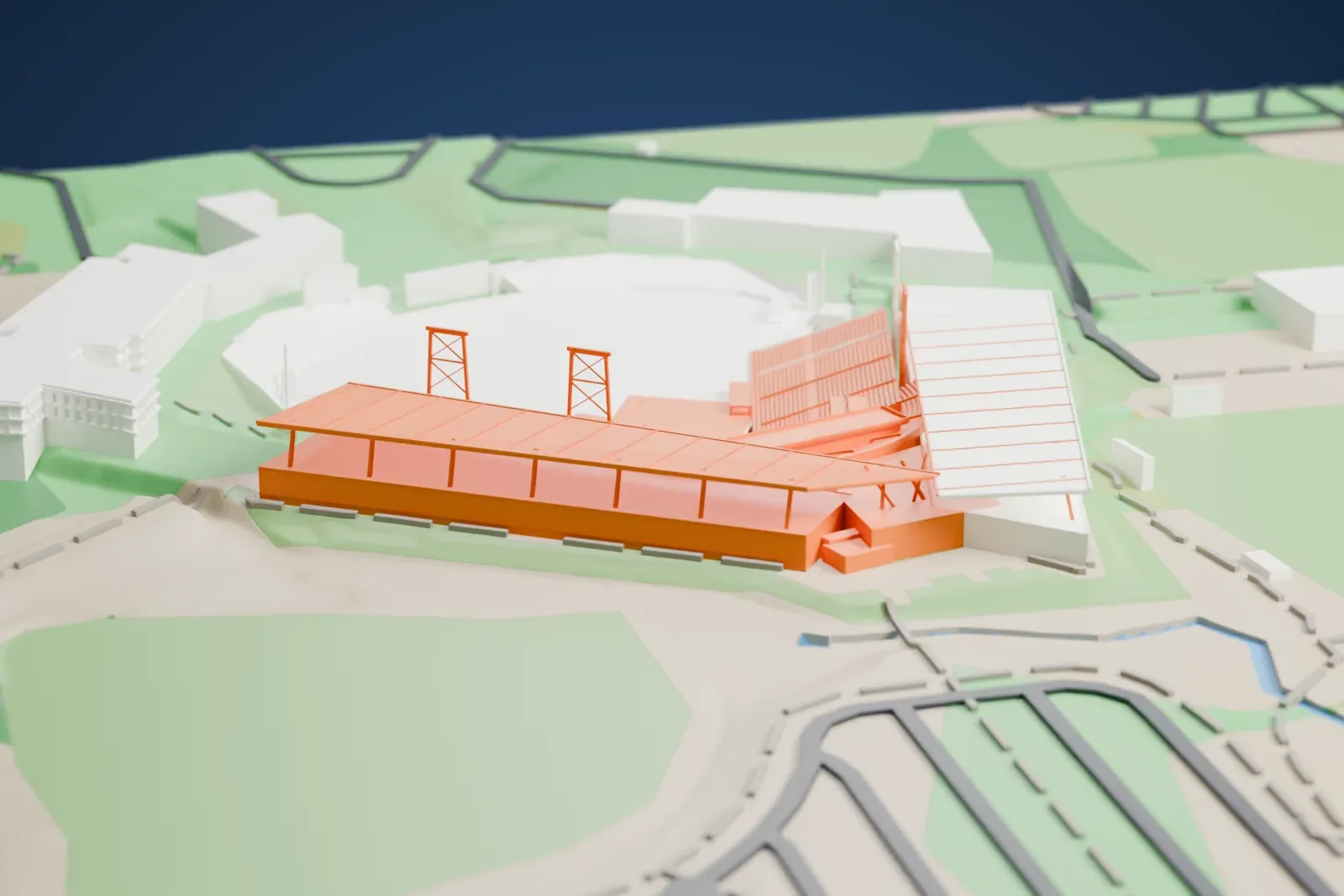 A white 3D print of Salt River Fields at Talking Stick, a baseball stadium with ridged grandstand roofs and light towers around a broad field, among green fields and a few low buildings.