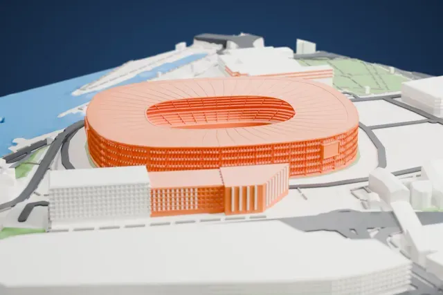 A white 3D print of the San Mamés Stadium model in Bilbao, with the streets around it.