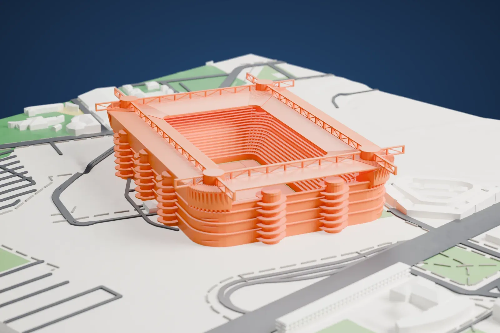 A white 3D print of the San Siro, a rectangular stadium with stacked rings of seating, round ramp towers on the outside and towers at the roof corners, surrounded by parking areas, roads and parkland.
