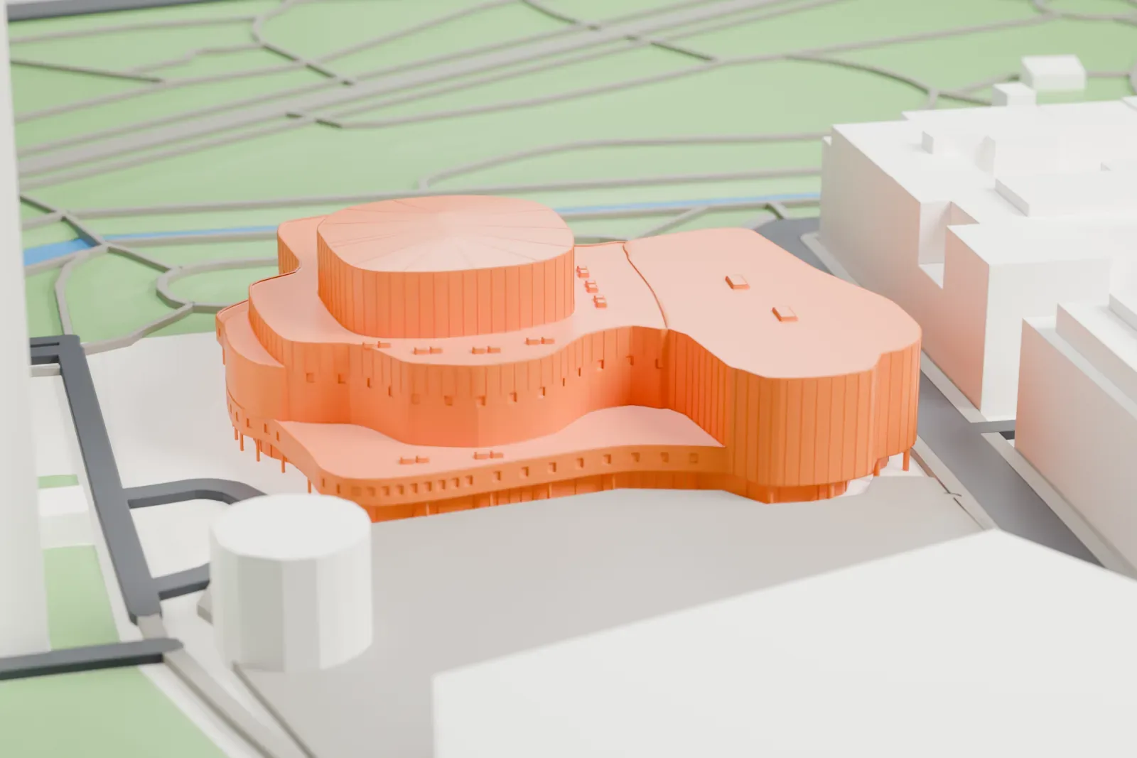 A white 3D print of the Düsseldorfer Schauspielhaus on Gustaf-Gründgens-Platz in Düsseldorf, among the surrounding city buildings.