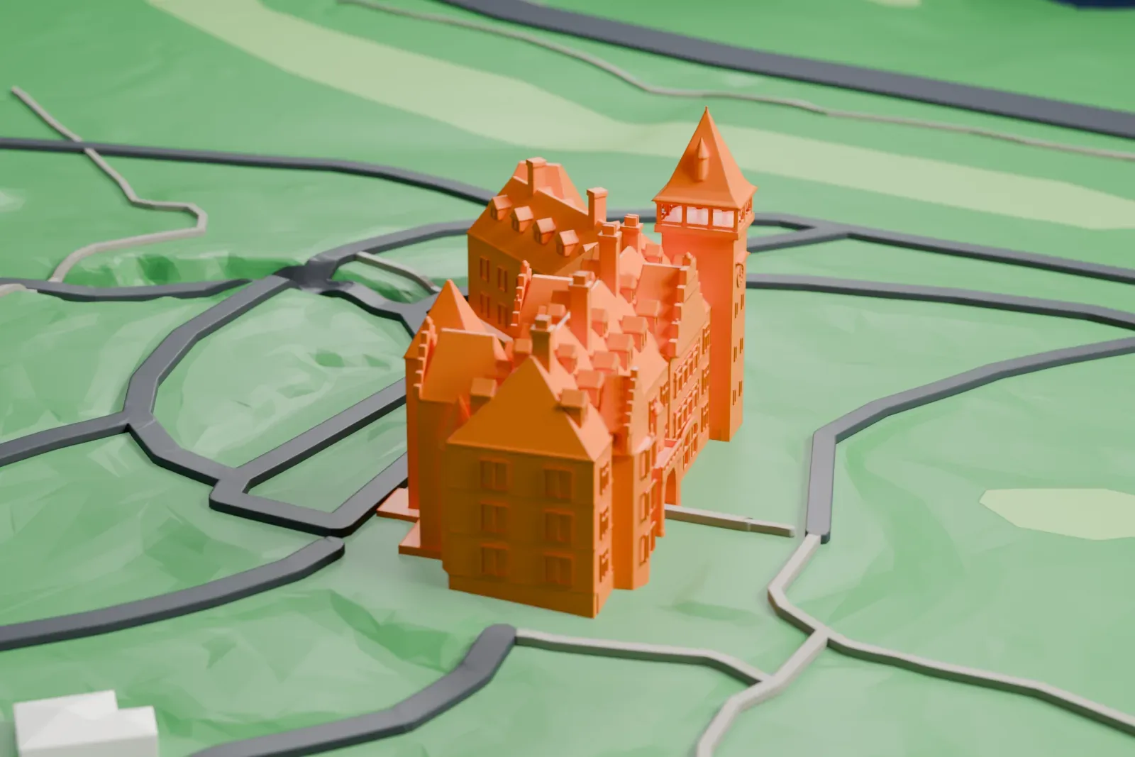 A white 3D print of Schlosshotel Kronberg, a castle with towers and steep roofs, among the surrounding park, streets and buildings.