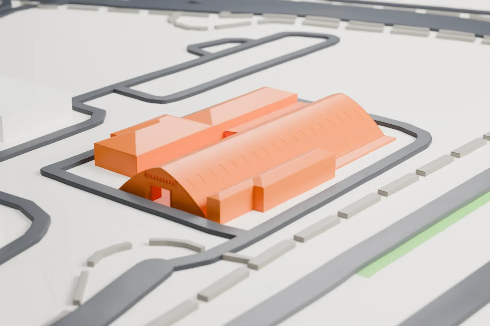 A white 3D print of Second World War Hangar No. 7, a long arched hangar with a ribbed roof, inside a ring road with neighboring low buildings.